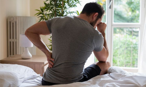 Waking Up With a Stiff Body? Here’s Why It Happens